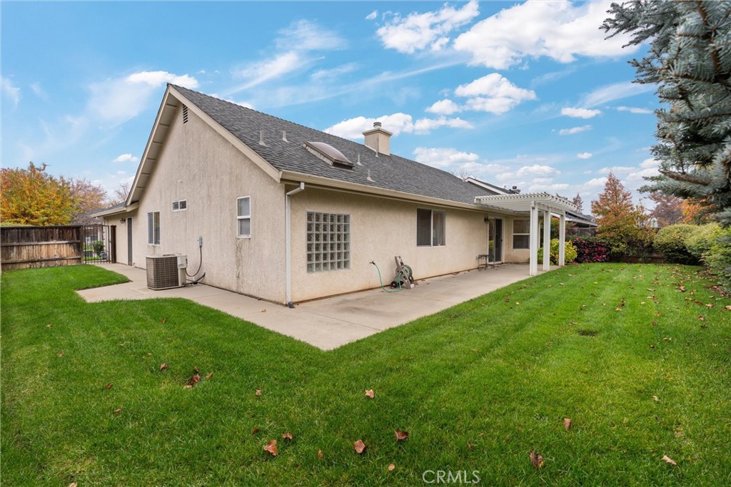 853 Coit Tower Way Chico, CA 95928 - Photo 46 of 49 a front view of house with yard and green space