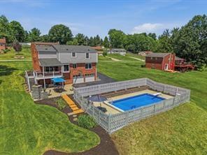 283 Brookwood Road Venetia, PA 15367 - Photo 25 of 36 an aerial view of a house with swimming pool garden and outdoor seating