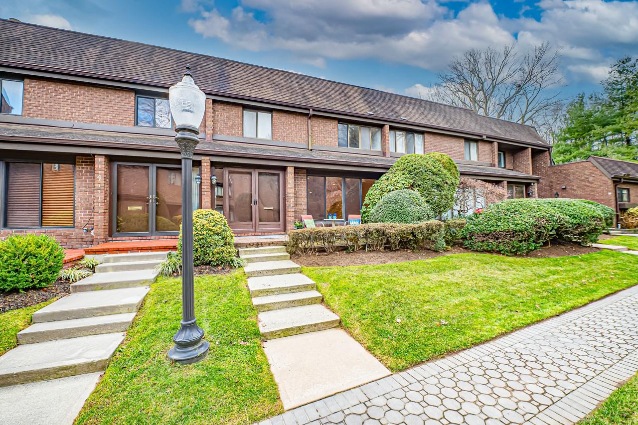 6 Fox Ridge Roslyn, NY 11576 - Photo 1 of 1 a front view of a house with a yard