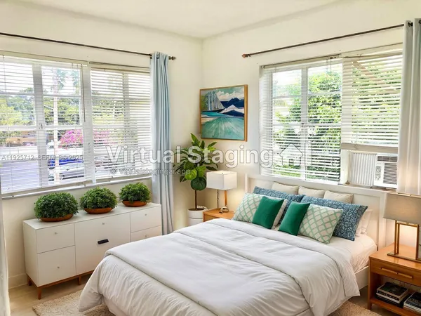 a bedroom with a bed chair and window