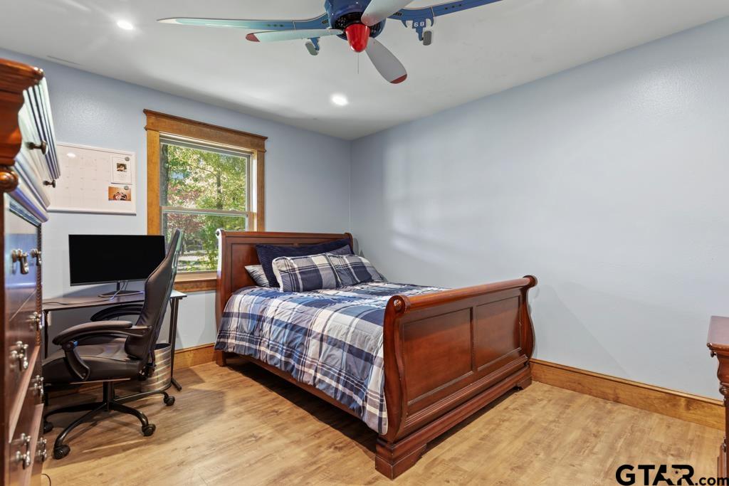 10433 County Road 334 Tyler, TX 75708 - Photo 21 of 43 a bedroom with a bed and a flat screen tv