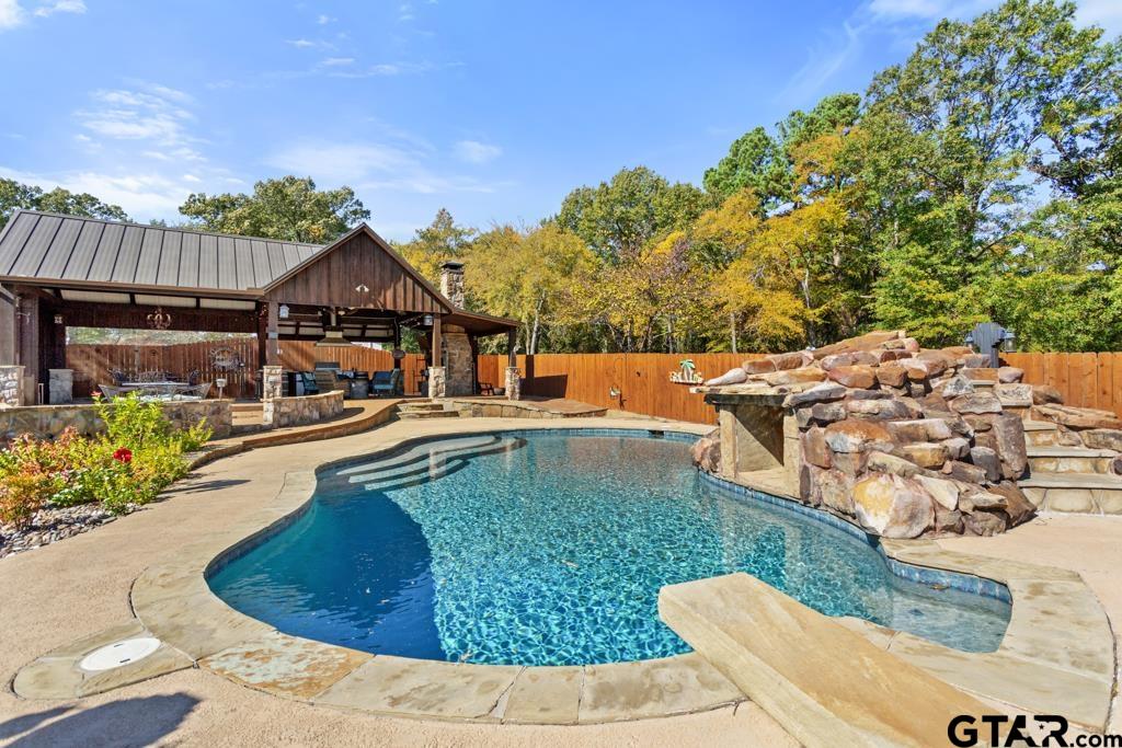 10433 County Road 334 Tyler, TX 75708 - Photo 22 of 43 swimming pool view with a seating space