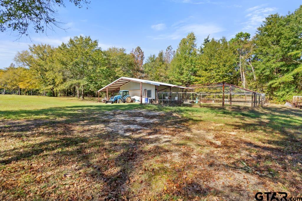 10433 County Road 334 Tyler, TX 75708 - Photo 36 of 43 a view of a house with a yard