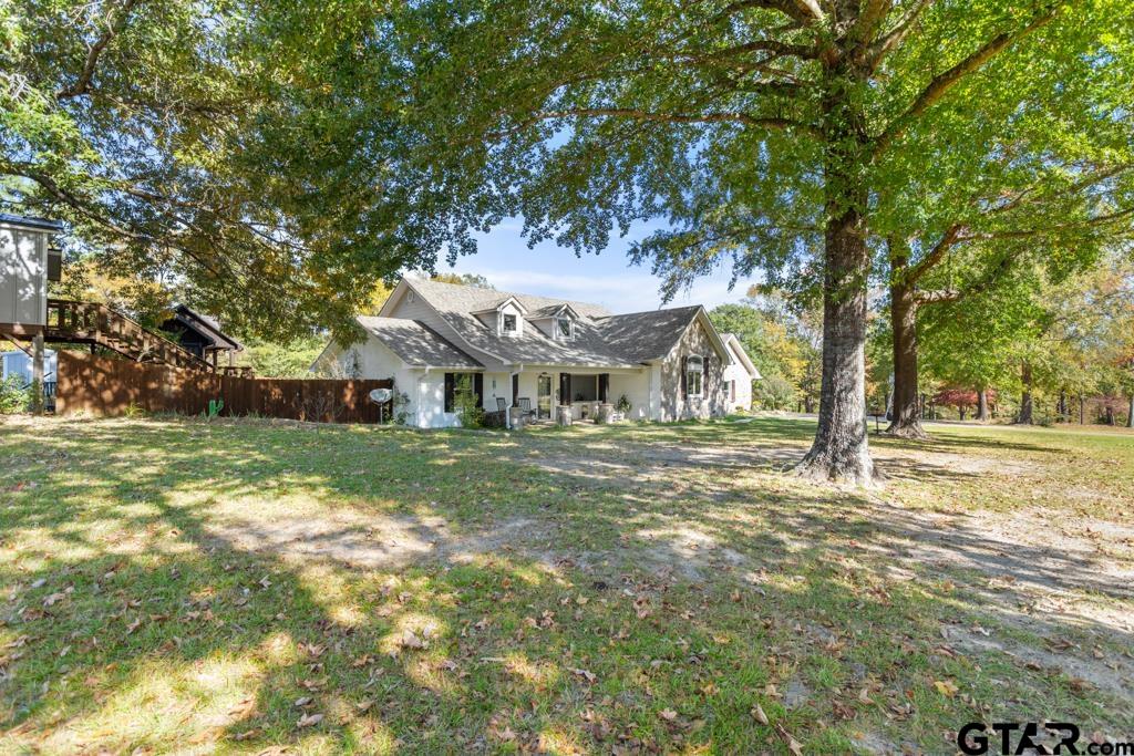 10433 County Road 334 Tyler, TX 75708 - Photo 4 of 43 a front view of house with yard and green space