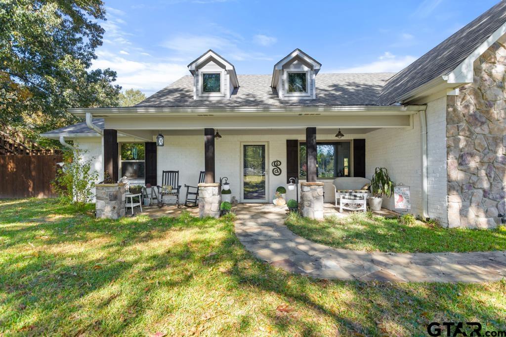 10433 County Road 334 Tyler, TX 75708 - Photo 5 of 43 a view of a house with backyard porch and sitting area