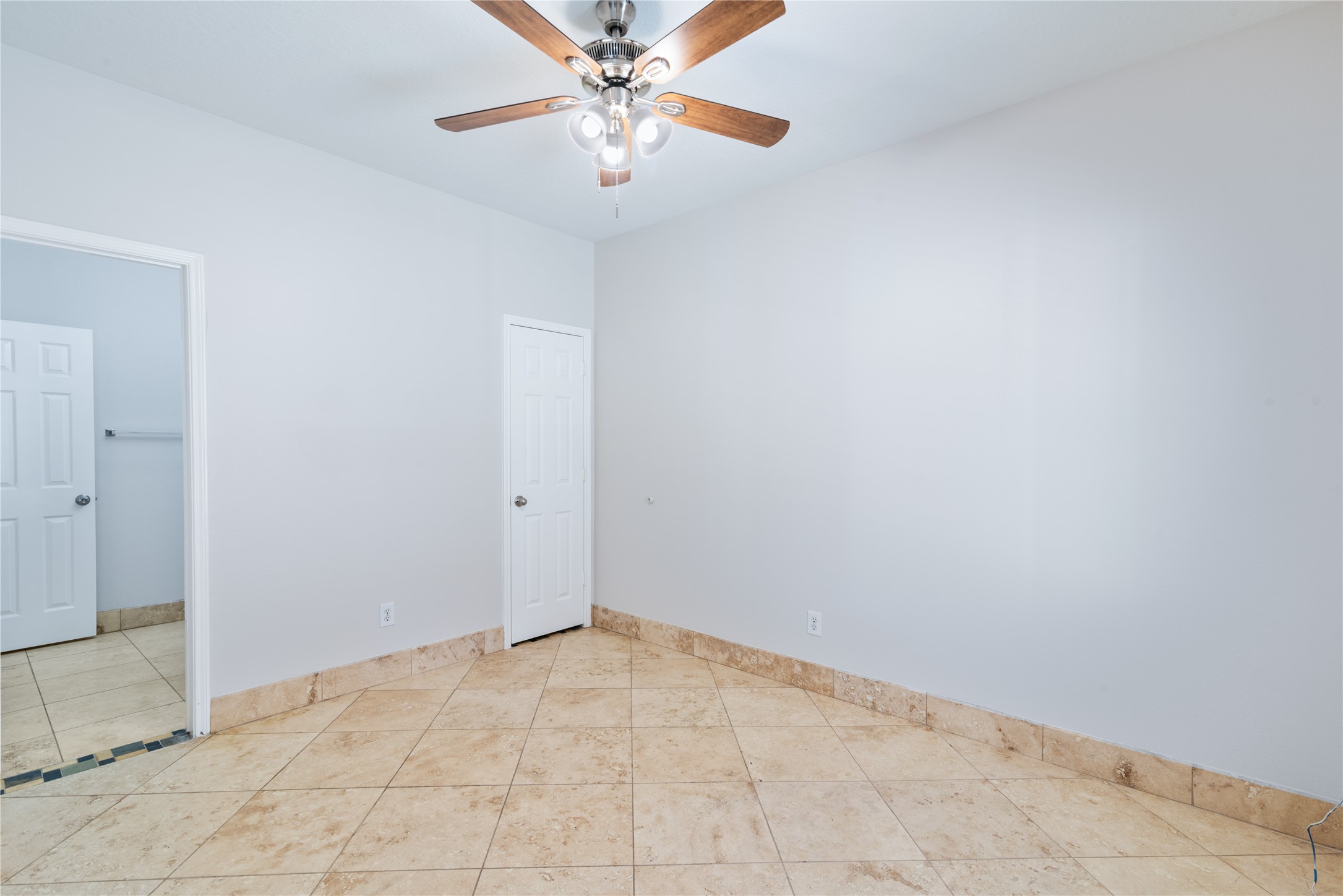 15423 Day Trip Trail Cypress, TX 77429 - Photo 13 of 31 an empty room with windows and fan