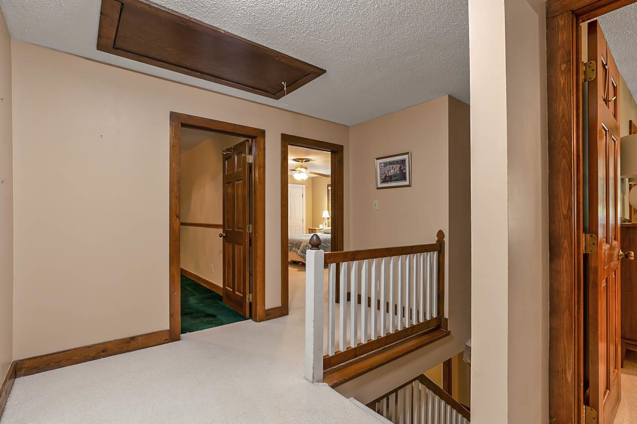 3109 Barnsley Lane Raleigh, NC 27604 - Photo 17 of 50 a view of a hallway with wooden floor and a hallway
