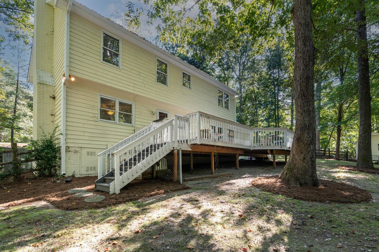 3109 Barnsley Lane Raleigh, NC 27604 - Photo 35 of 50 a view of a house with a yard