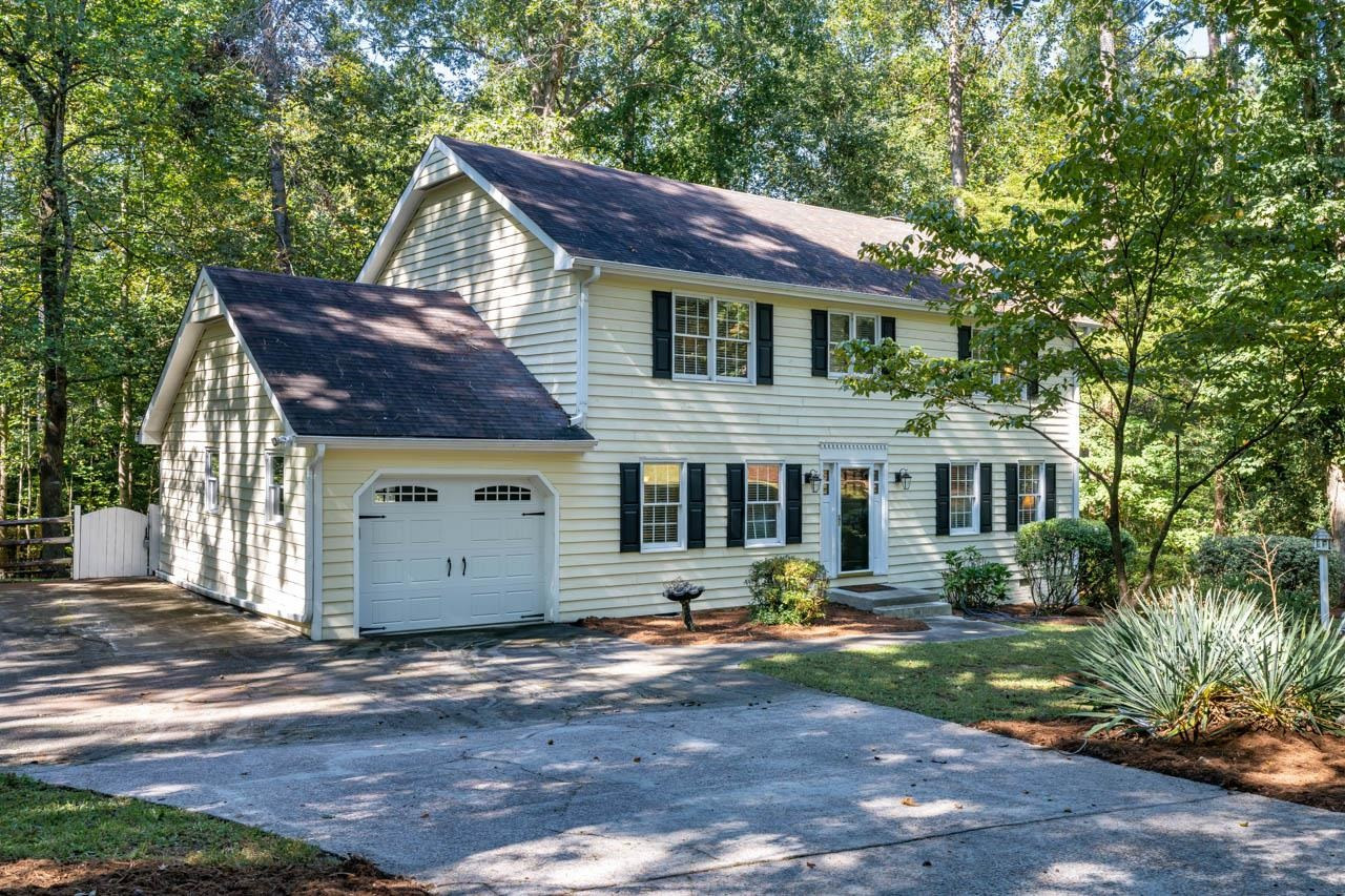3109 Barnsley Lane Raleigh, NC 27604 - Photo 43 of 50 a view of a house with a yard