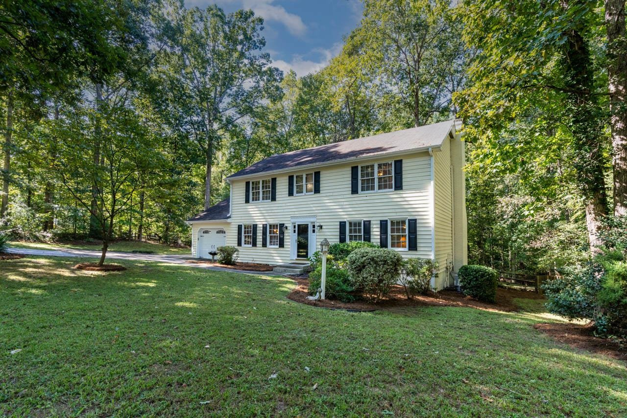 3109 Barnsley Lane Raleigh, NC 27604 - Photo 44 of 50 a front view of a house with a garden