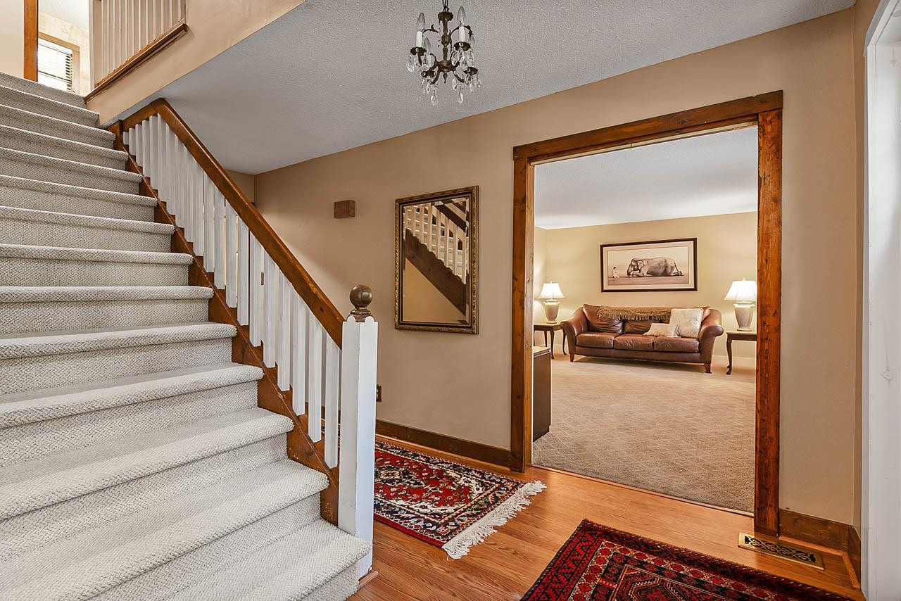 3109 Barnsley Lane Raleigh, NC 27604 - Photo 6 of 50 a view of a livingroom with furniture and stairs