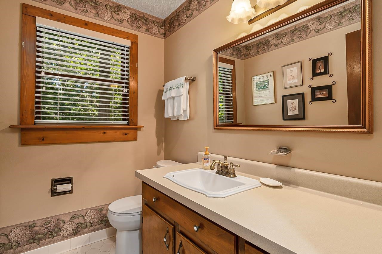 3109 Barnsley Lane Raleigh, NC 27604 - Photo 8 of 50 a bathroom with a sink and a toilet