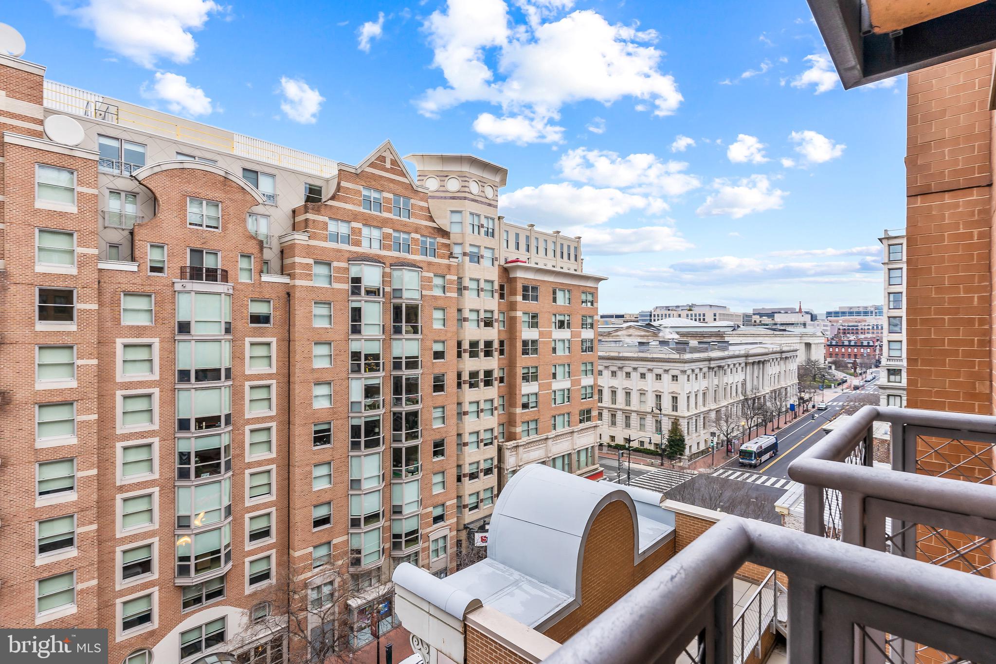 616 E Street Northwest, Unit 810 Washington, DC 20004 - Photo 11 of 15 a view of a balcony with a couch