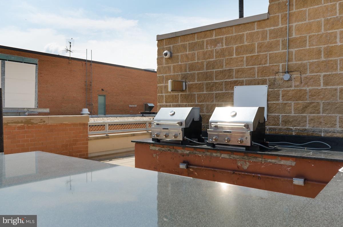 616 E Street Northwest, Unit 810 Washington, DC 20004 - Photo 13 of 15 a view of bathroom with washing machine