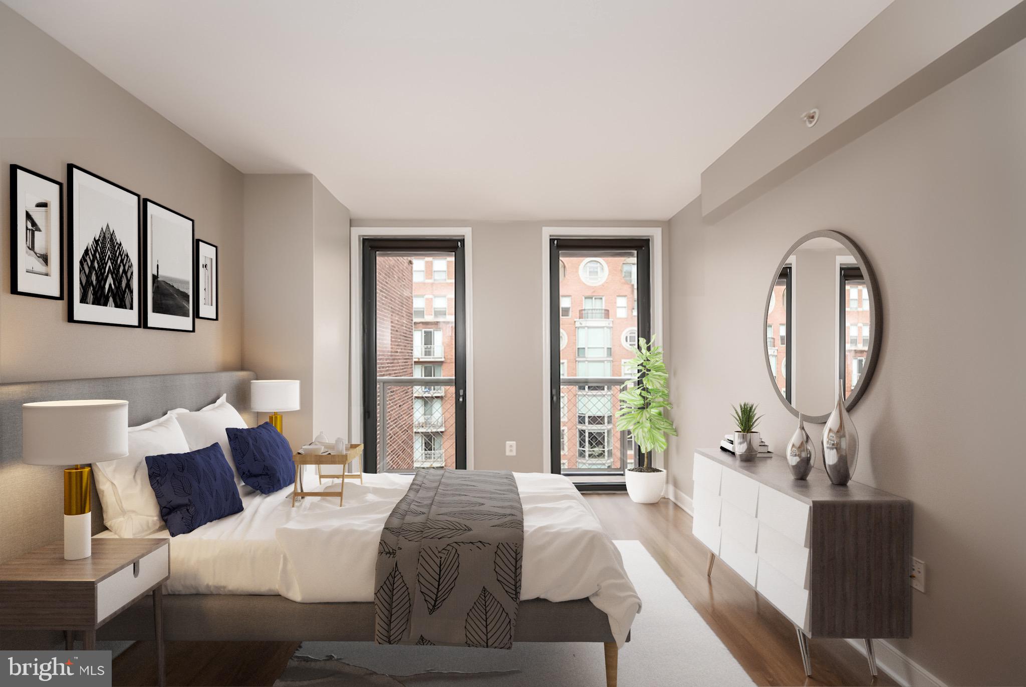 616 E Street Northwest, Unit 810 Washington, DC 20004 - Photo 8 of 15 a bedroom with bed a mirror on the dresser and a large window