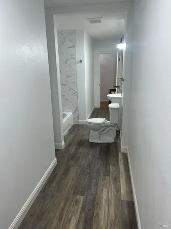 a bathroom with a sink and a toilet