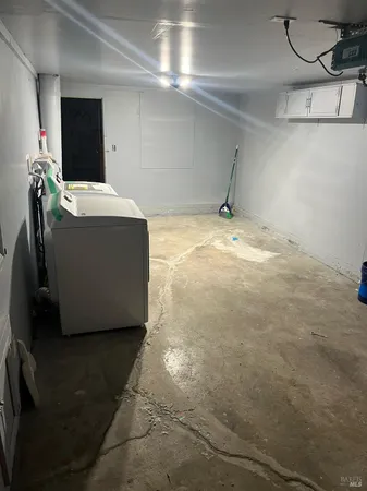 a room with a washer and dryer