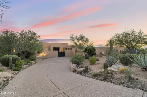 a view of living room with furniture and fireplace