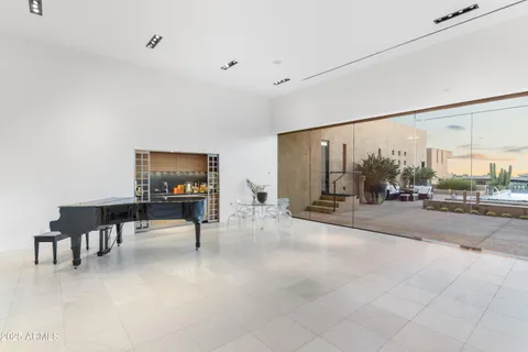 a outdoor dining space with furniture and garden view