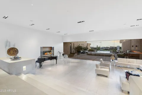 a living room with furniture and a table