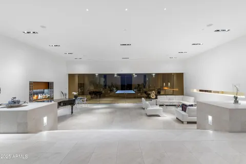 a spacious bedroom with a bed and furniture