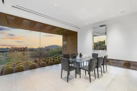 a bathroom with a sink a mirror and a bathtub