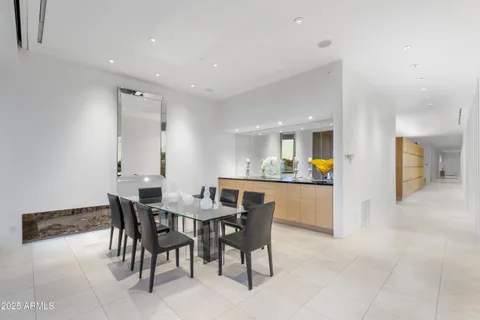 a view of a balcony with furniture