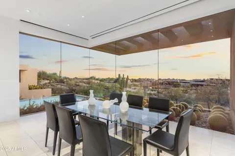 a view of a room with furniture and a window