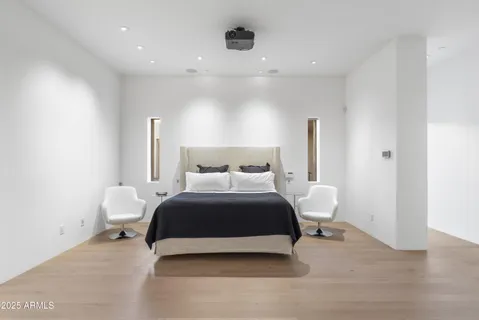 a view of swimming pool with outdoor seating