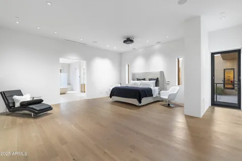 a view of a house with a yard and a garden