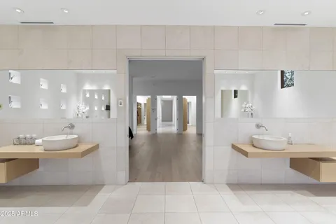 a view of swimming pool with outdoor seating and a window