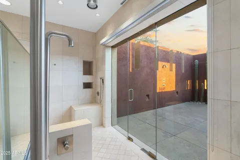 a view of swimming pool with lake and mountain in the back