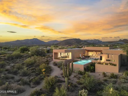a view of a city with mountains in the background