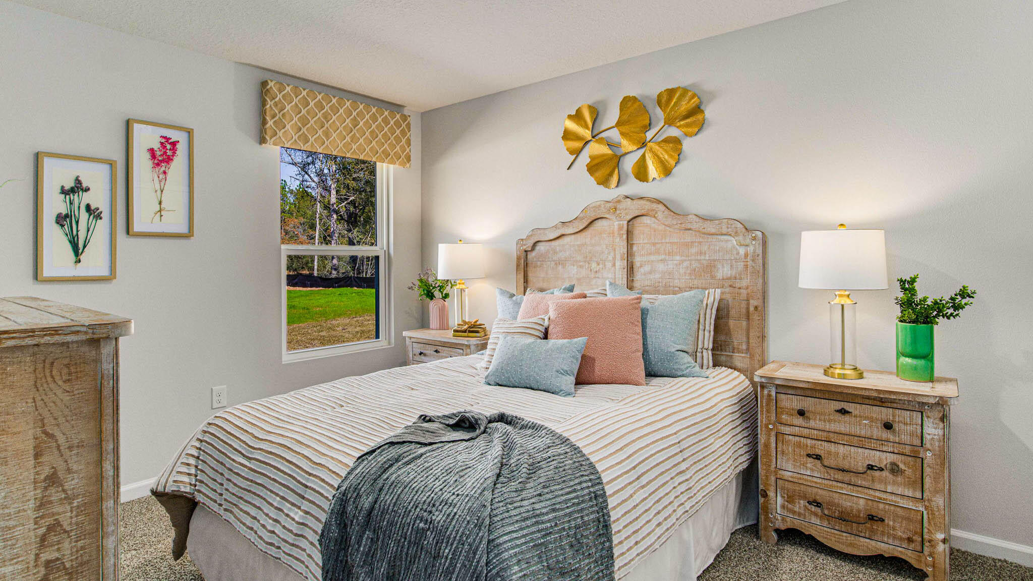 2419 South Silver Street Crestview, FL 32536 - Photo 18 of 37 a bedroom with a bed and a chandelier