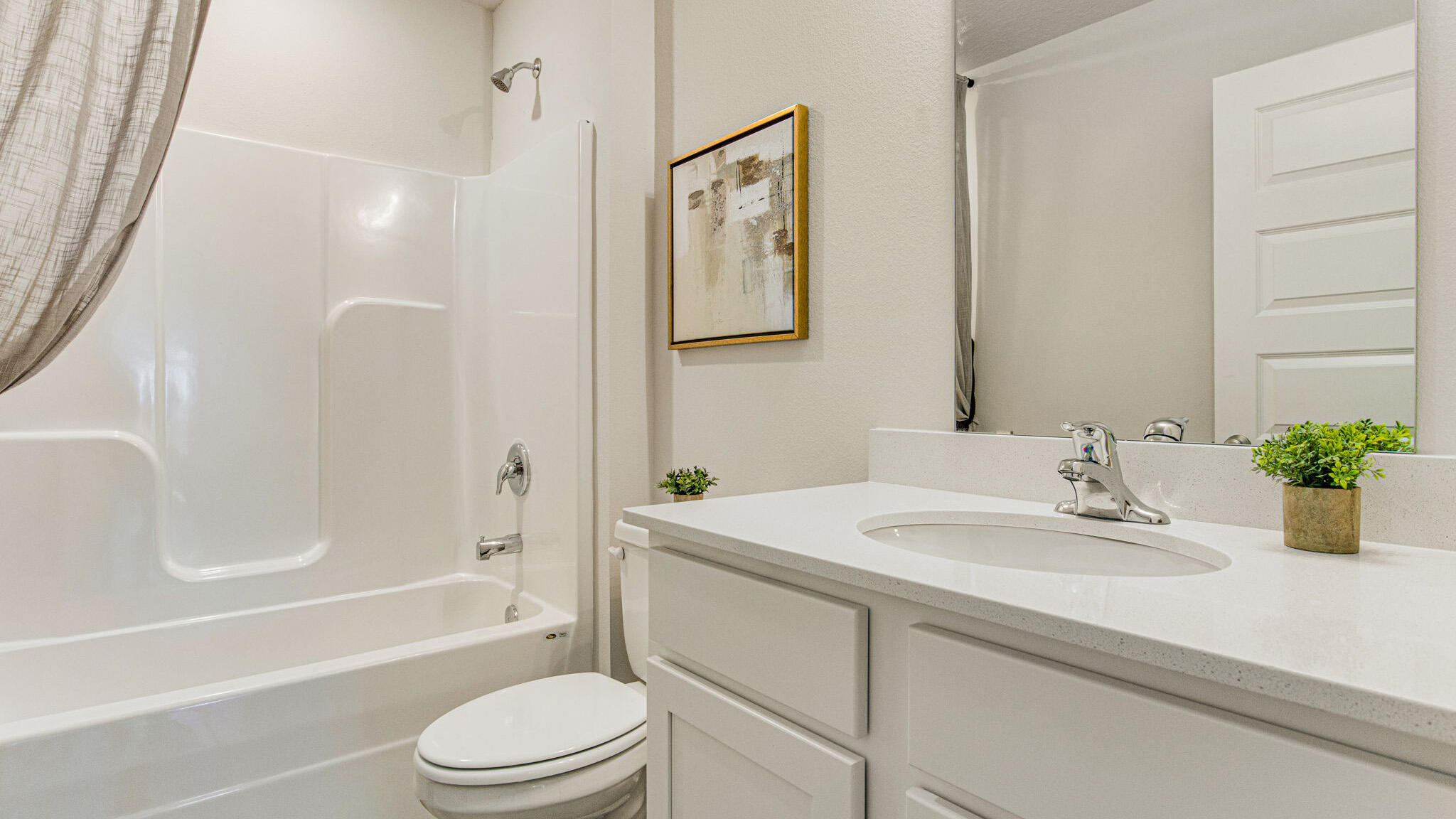 2419 South Silver Street Crestview, FL 32536 - Photo 24 of 37 a bathroom with a sink toilet and shower