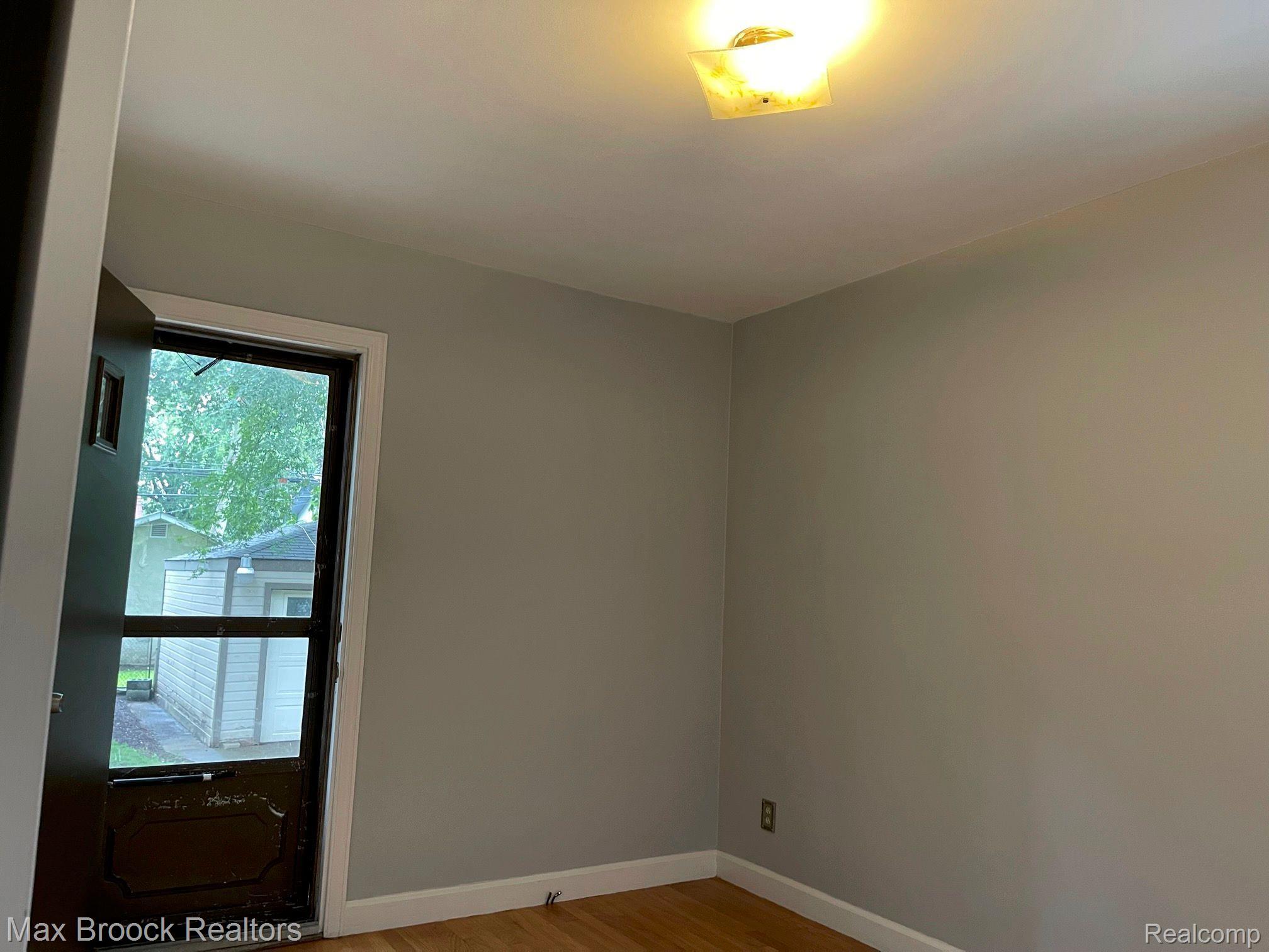 7 Devonshire Road Pleasant Ridge, MI 48069 - Photo 19 of 39 Second Bedroom with Door Access to Patio