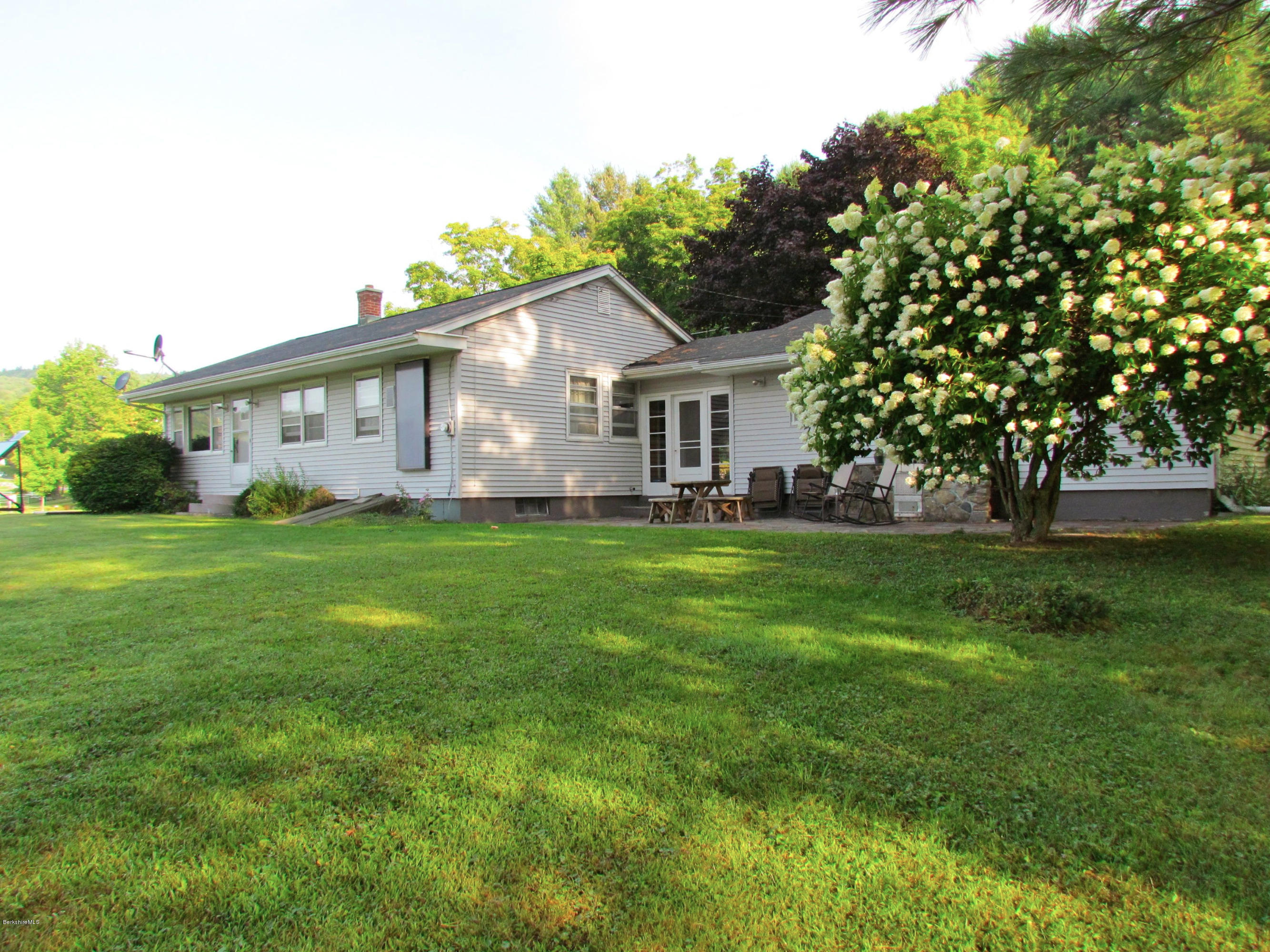 102 Clough Road Stamford, VT 05352 - Photo 13 of 13 a front view of house with yard and green space