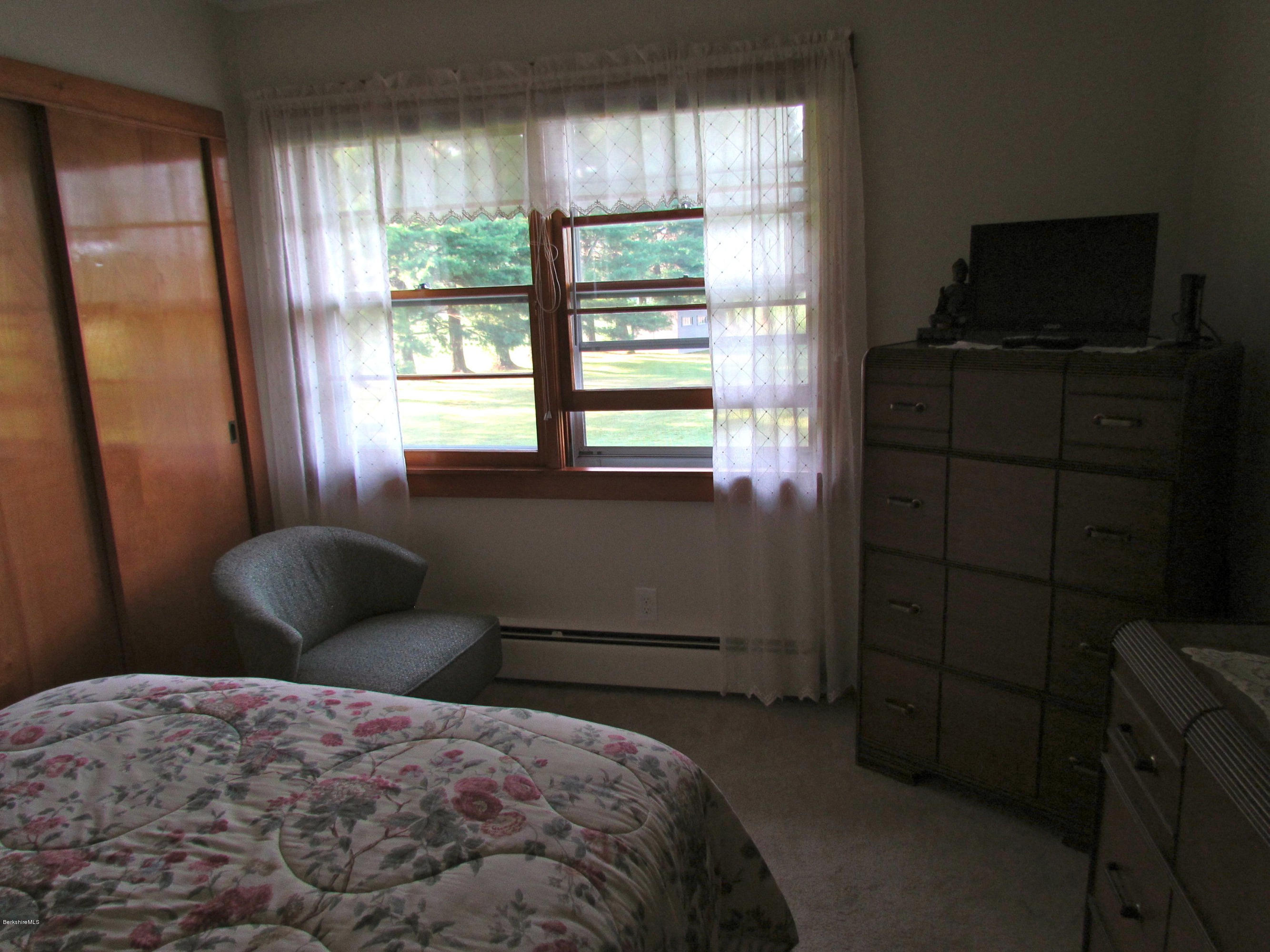 102 Clough Road Stamford, VT 05352 - Photo 5 of 13 a bedroom with a bed and a window