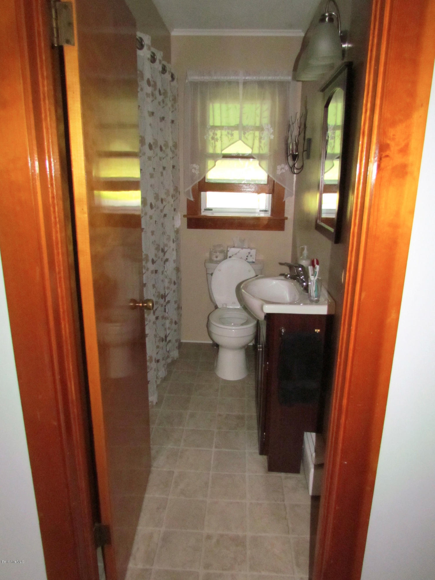 102 Clough Road Stamford, VT 05352 - Photo 6 of 13 a bathroom with a sink a toilet and shower