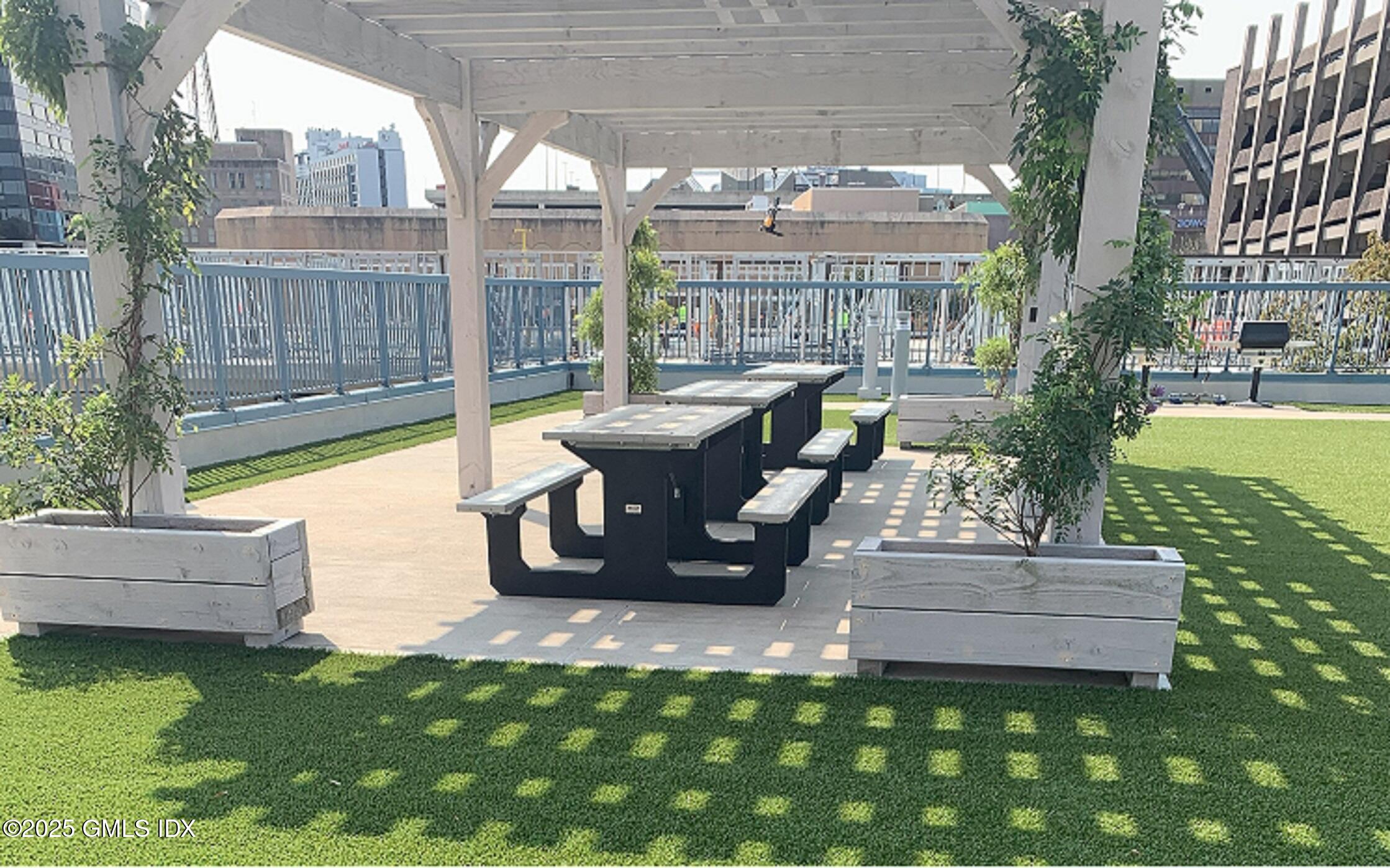 25 Forest Street, Unit 8C Stamford, CT 06901 - Photo 22 of 25 a view of outdoor space yard and patio