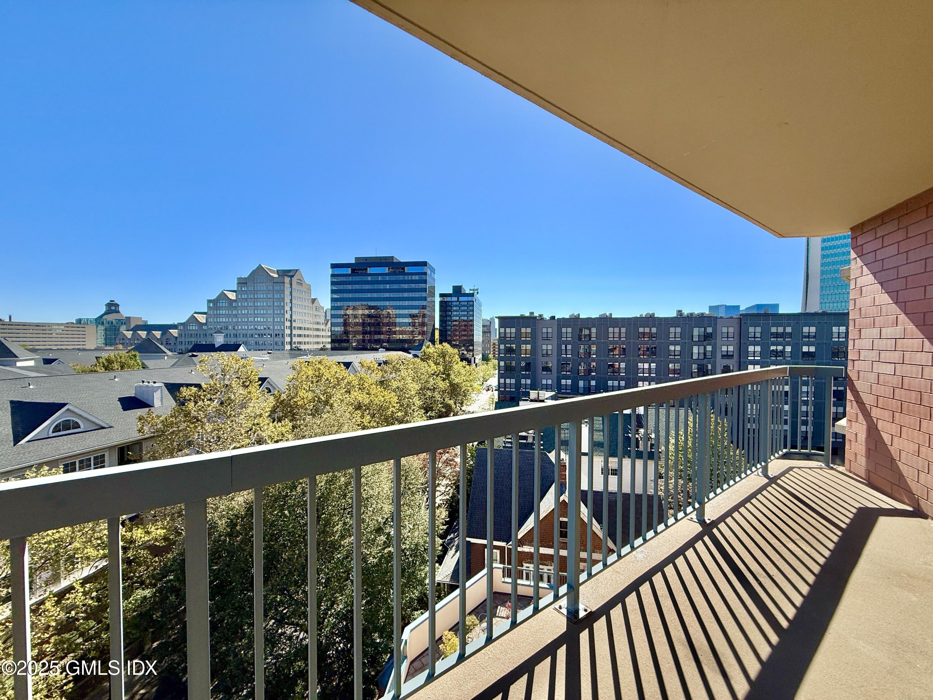 25 Forest Street, Unit 8C Stamford, CT 06901 - Photo 9 of 25 a view of city from a balcony
