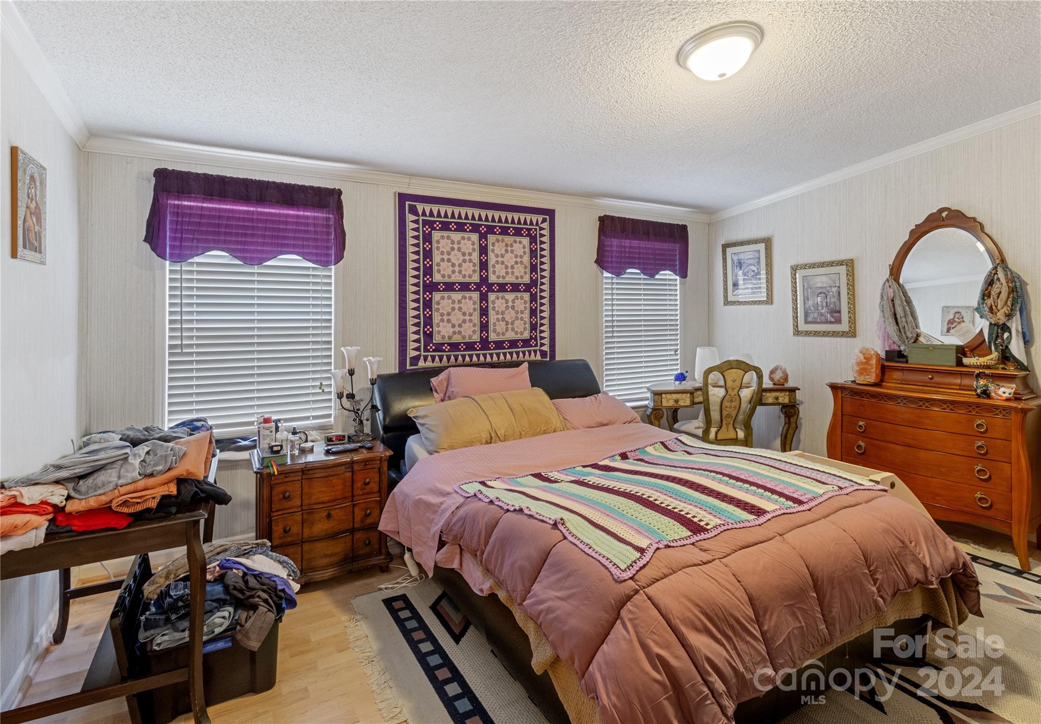65 Fraser Hill Drive Mars Hill, NC 28754 - Photo 16 of 39 a bed room with a bed and a dresser