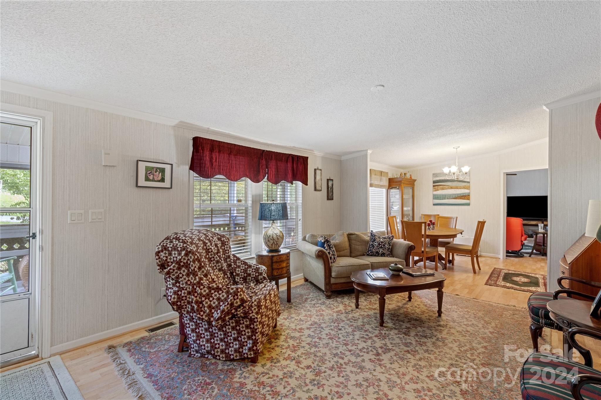 65 Fraser Hill Drive Mars Hill, NC 28754 - Photo 18 of 39 a living room with furniture rug and window