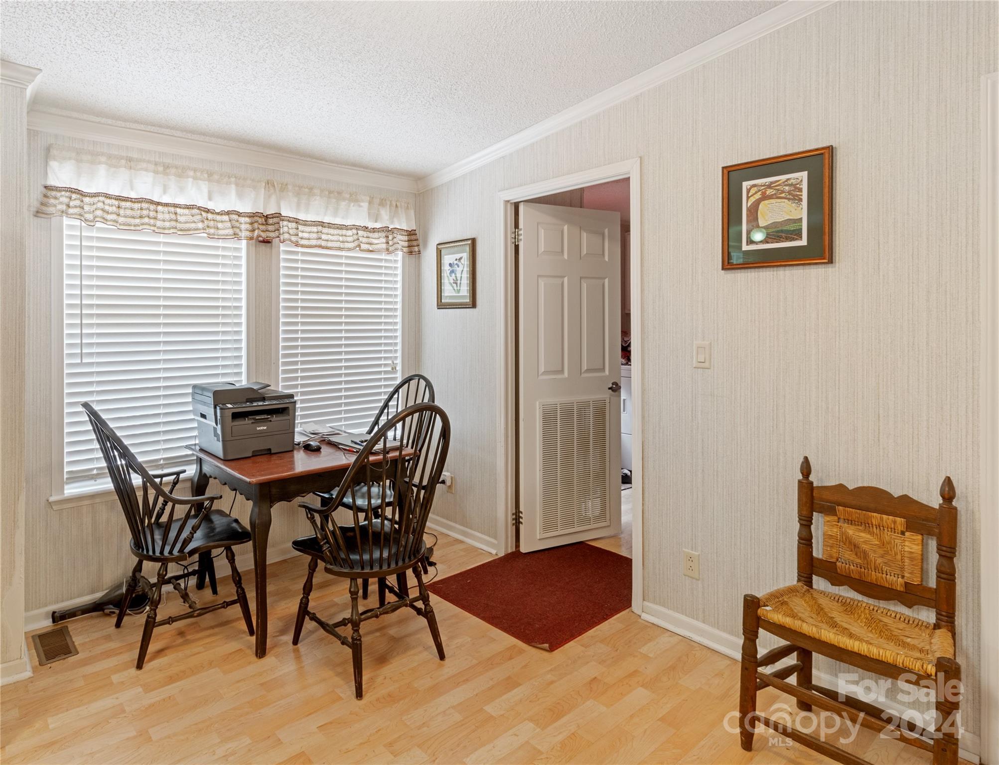 65 Fraser Hill Drive Mars Hill, NC 28754 - Photo 23 of 39 a view of a dining room with furniture and wooden floor