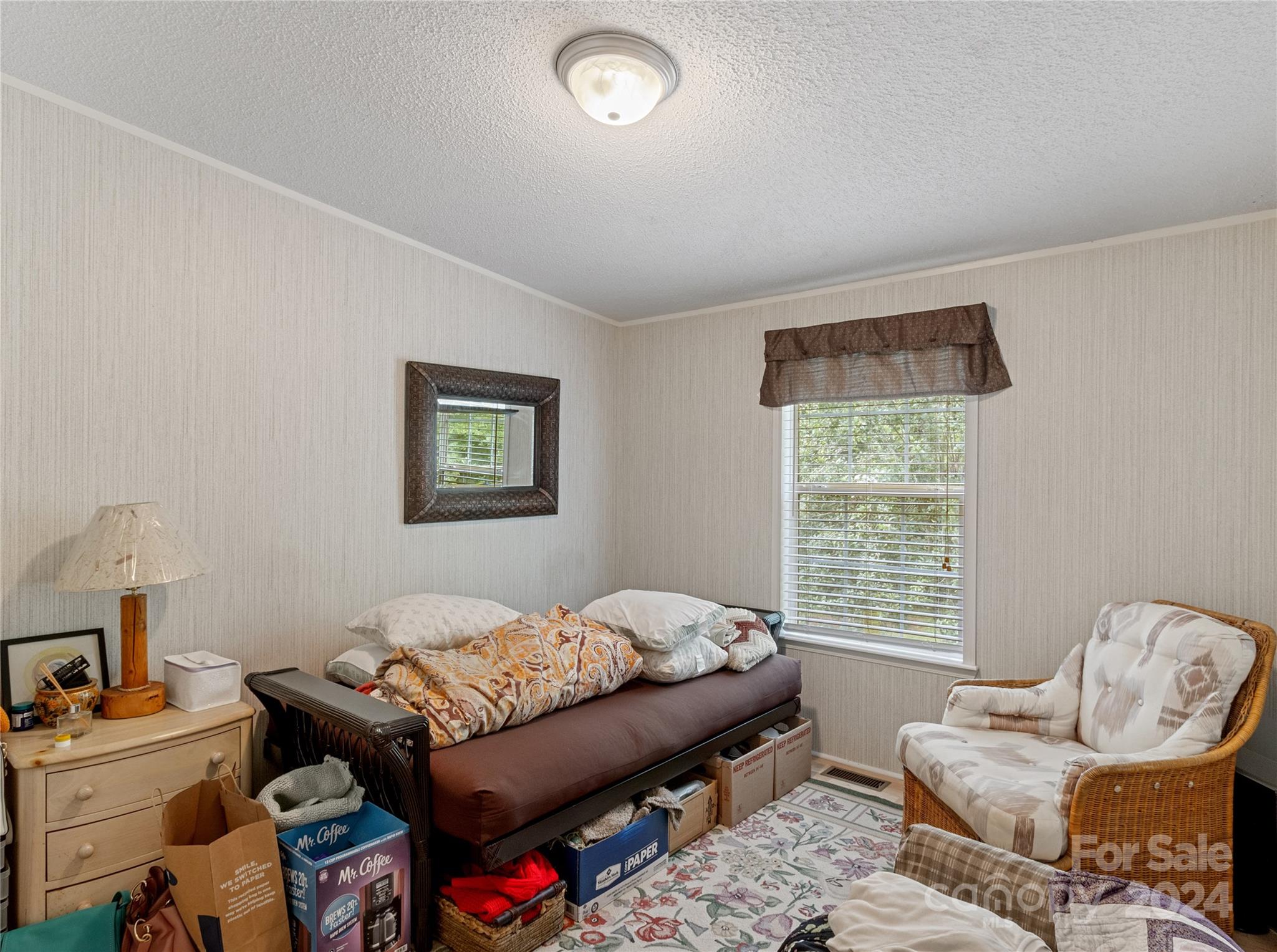 65 Fraser Hill Drive Mars Hill, NC 28754 - Photo 27 of 39 a bedroom with furniture and a window