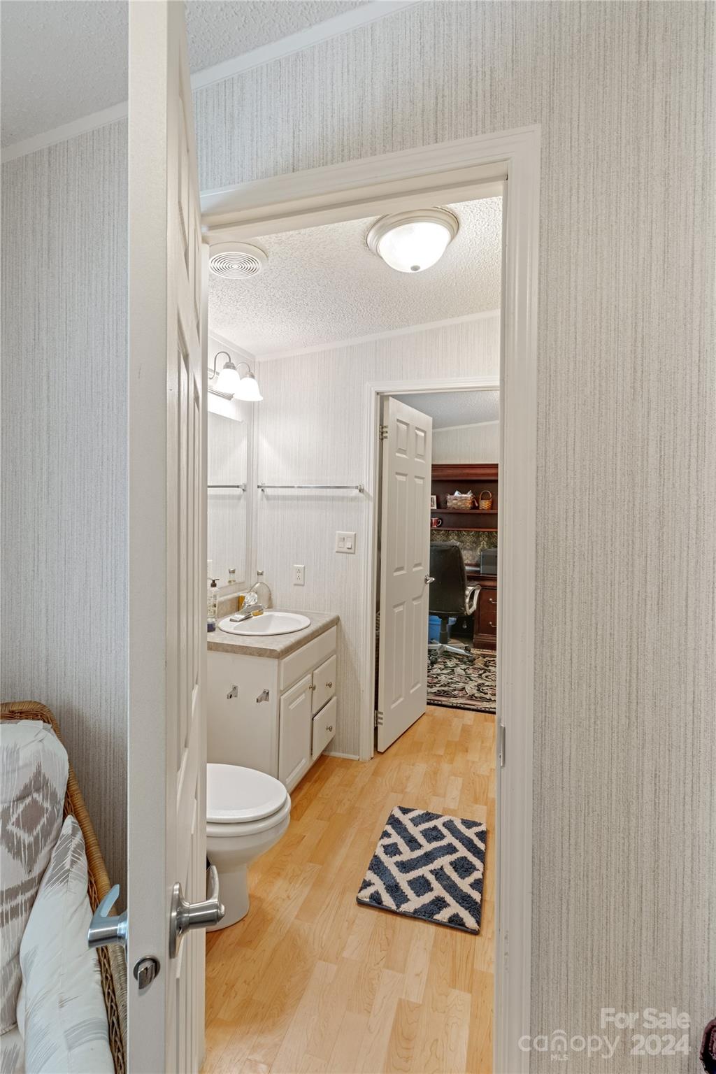 65 Fraser Hill Drive Mars Hill, NC 28754 - Photo 31 of 39 a bathroom with a granite countertop sink toilet and shower