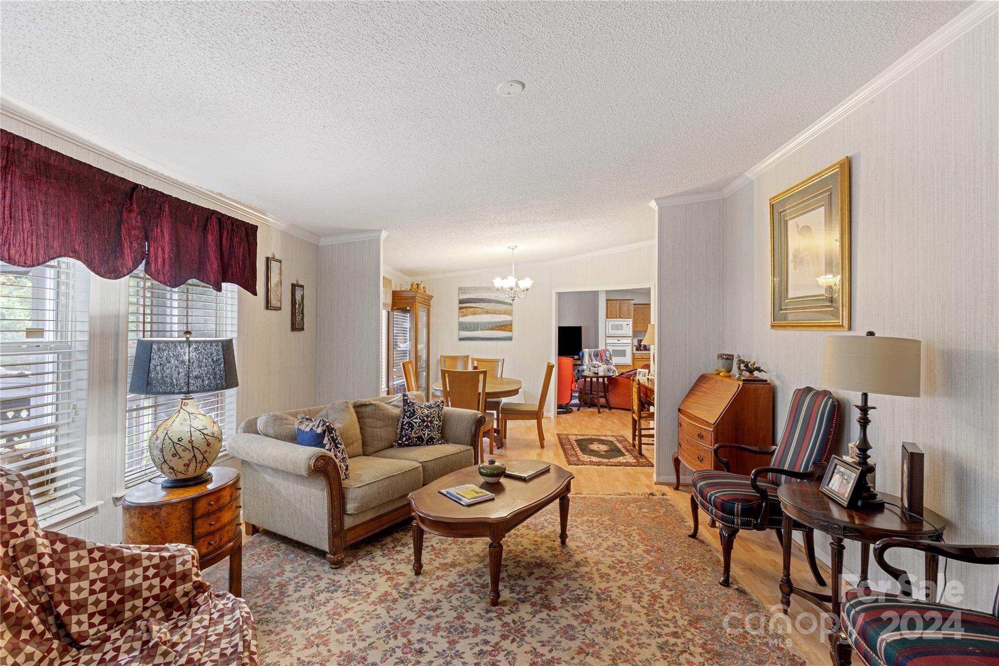 65 Fraser Hill Drive Mars Hill, NC 28754 - Photo 8 of 39 a living room with furniture and wooden floor