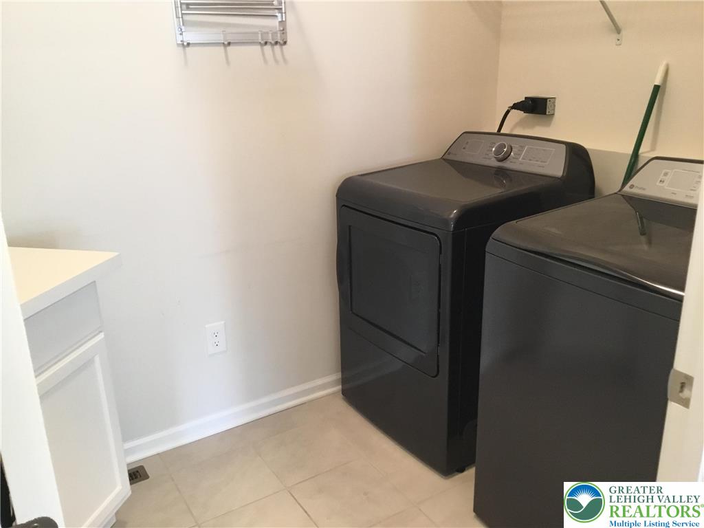 4088 Eveningstar Road Emmaus, PA 18049 - Photo 58 of 78 a utility room with dryer and washer