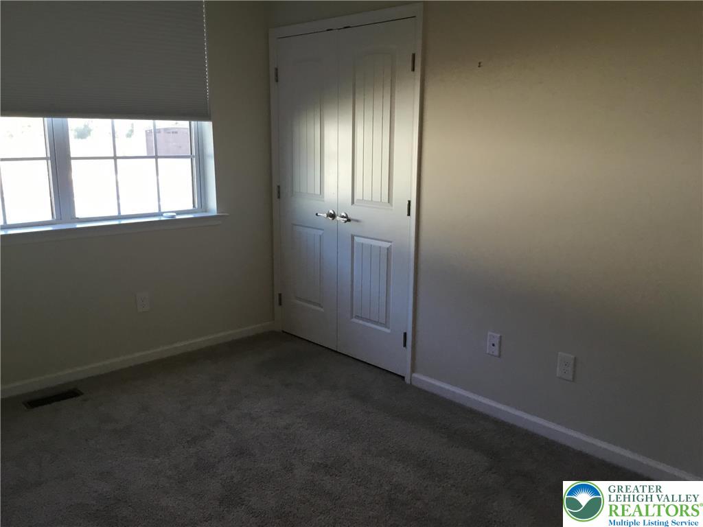 4088 Eveningstar Road Emmaus, PA 18049 - Photo 59 of 78 an empty room with windows