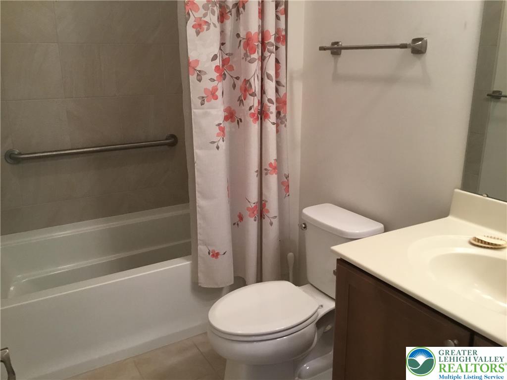 4088 Eveningstar Road Emmaus, PA 18049 - Photo 77 of 78 a white toilet sitting next to a bath tub